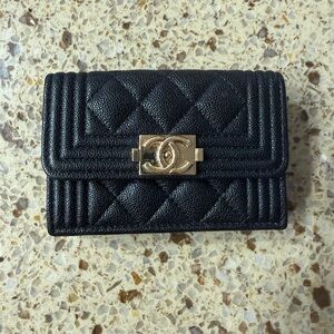 CHANEL Black Quilted Wallet with Gold Accent